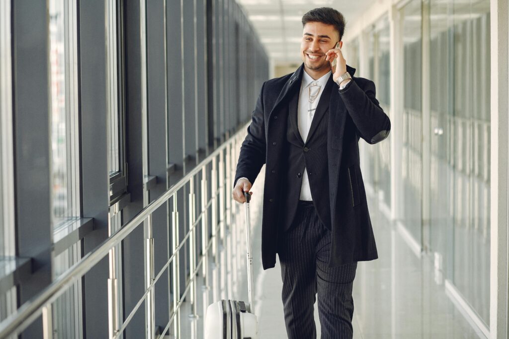 Hourly / As-Directed Service a man in a suit talking on a cell phone